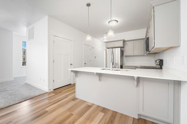Building Photo - Modern Herriman Condo with Stylish Living & Community Amenities!