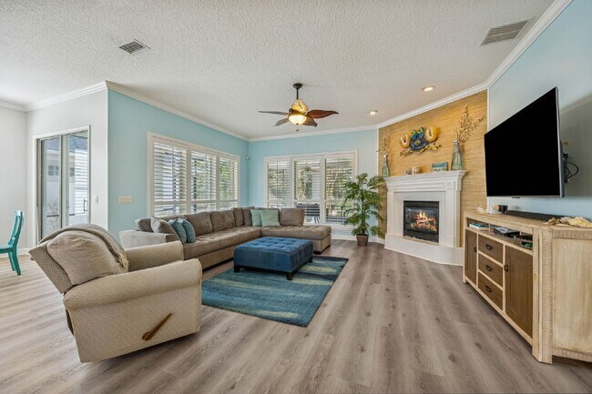 Building Photo - Coastal Living Just 2 Blocks from the Beach | Gated Community + Resort Amenities