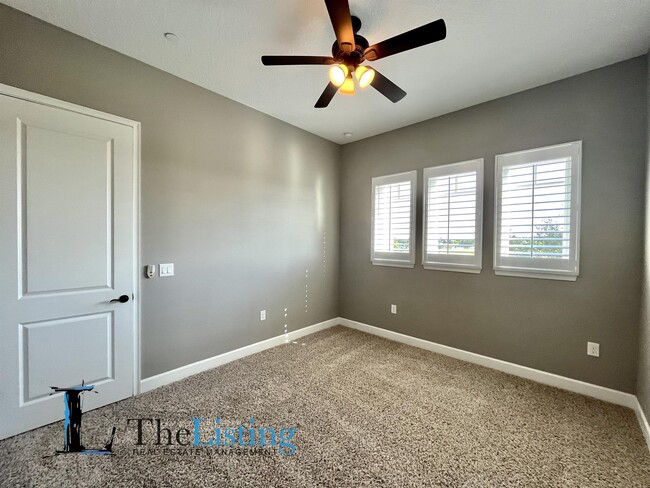 Building Photo - 8144 Tavistock Lakes Blvd