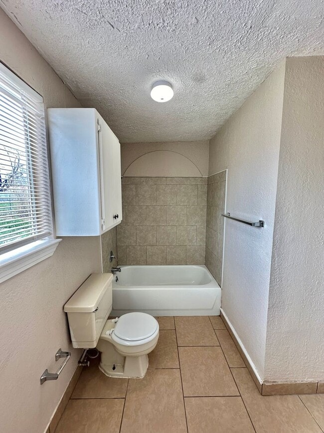 Building Photo - COMING MAY 2026 - Spacious & Centrally Located 3-Bedroom 2-Bathroom Home!