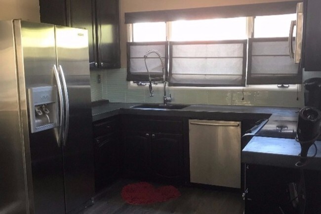 Kitchen, stainless steel appliances, concrete - 1314 16th St