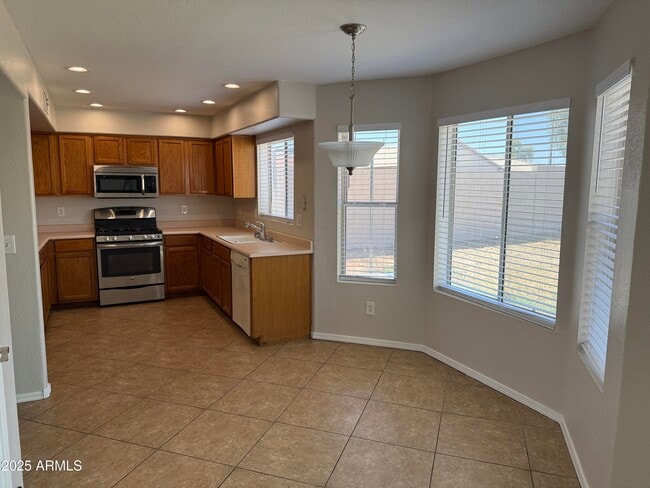 Building Photo - 8460 W Aster Dr