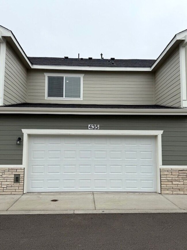 Building Photo - New 2 Bedroom Townhome + 2 Car Garage