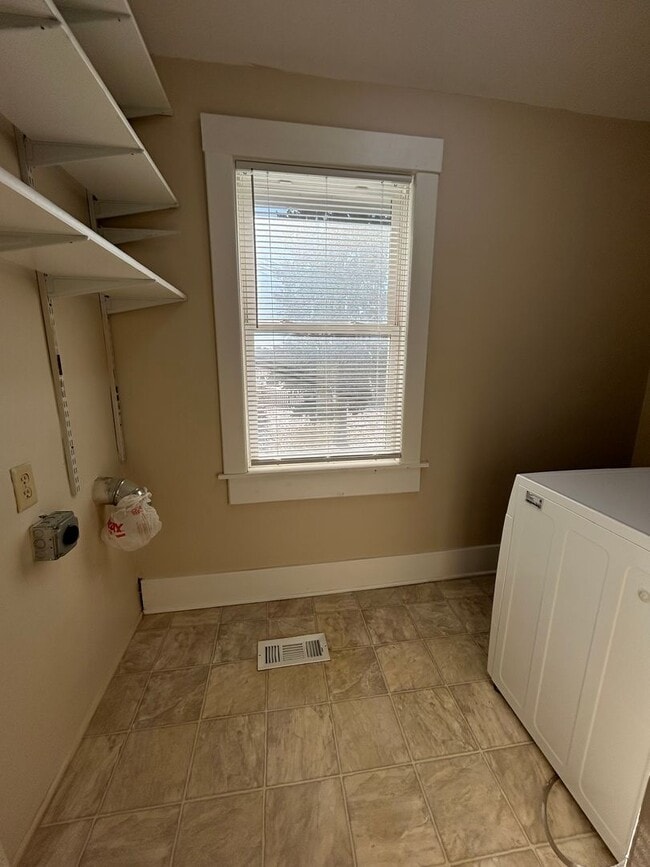 Building Photo - Charming 2-Bedroom Home Between Dundee & Blackstone with Large Attached Garage & Hardwood Floors