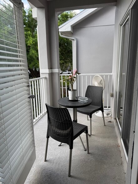 Front balcony - 9410 Georgian Park Ln