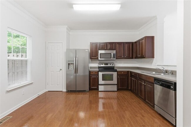 Building Photo - 6710 Stoneleigh Way