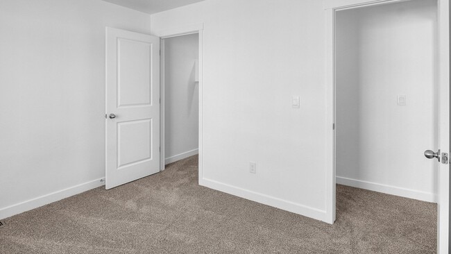 Building Photo - Brand-New Modern Townhome with Stunning Views!