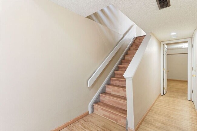 Building Photo - Updated 3-Bedroom Condo with Granite Kitchen in Low-Maintenance Community