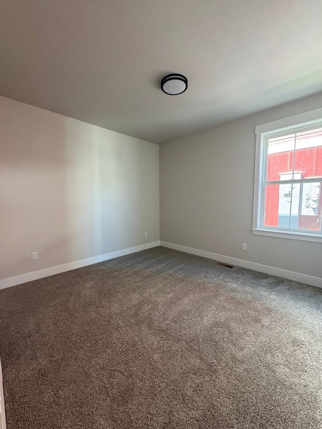 Building Photo - New construction townhome – two bed two bath with garage