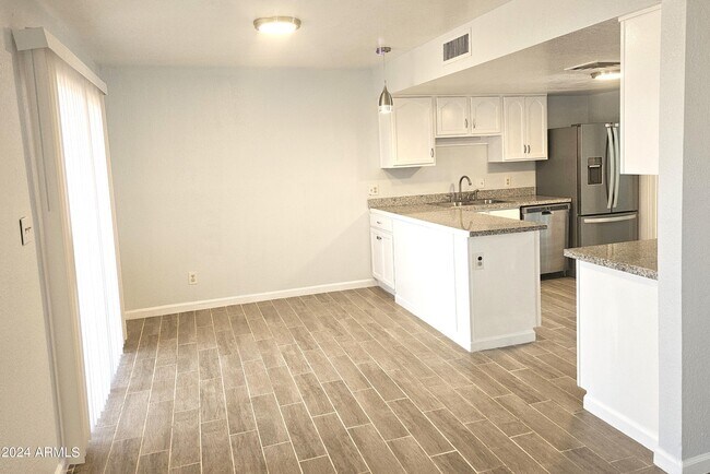 Building Photo - 8220 W Monaco Blvd