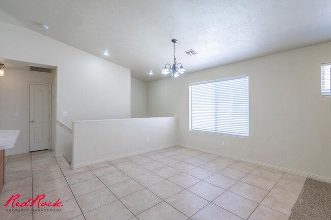 Building Photo - Fresh Carpet! Spacious 5-Bedroom Townhome