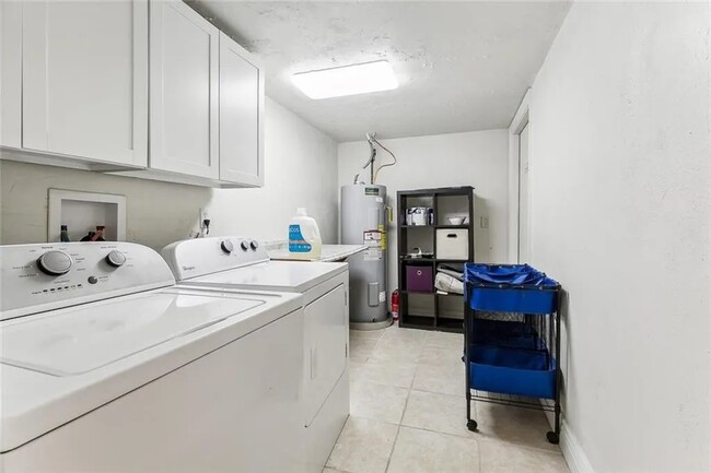 large laundry and storage space - 5830 S Robertson St