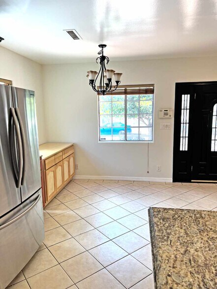 Dining area left of main entrance. - 2330 S Mansfield Ave