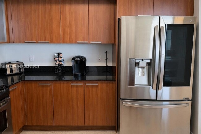 Building Photo - 16699 Collins Ave