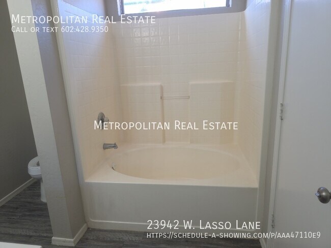 Building Photo - 23942 W Lasso Ln