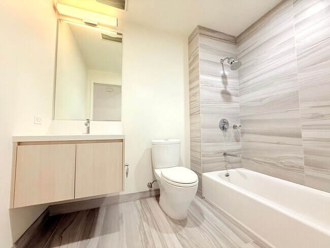 Building Photo - ***MOVE-IN SPECIAL ONE MONTH FREE RENT***Very Unique Spacious Two Bedroom - Two bath luxury Condo...