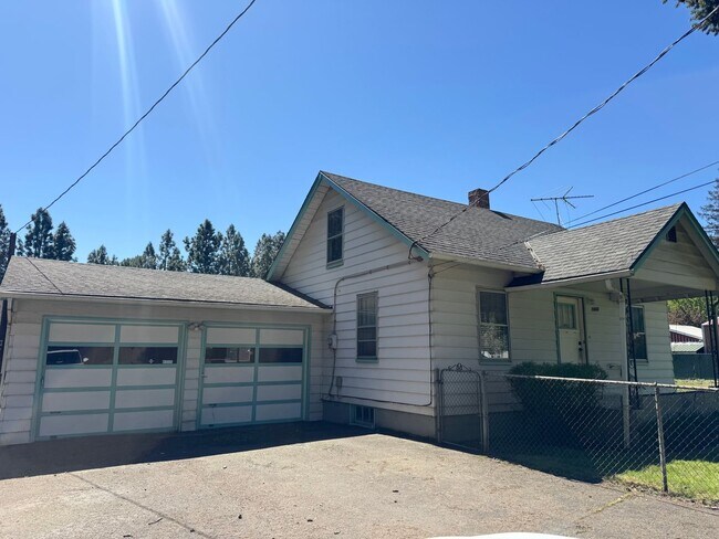 Building Photo - Spacious & Updated Home with Bonus Room, Large Basement, & Garage