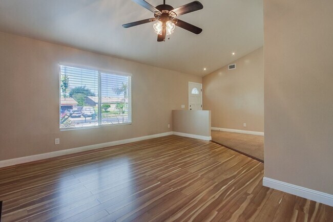Building Photo - Beautiful 3 Bedroom + Den Home in the Foot...