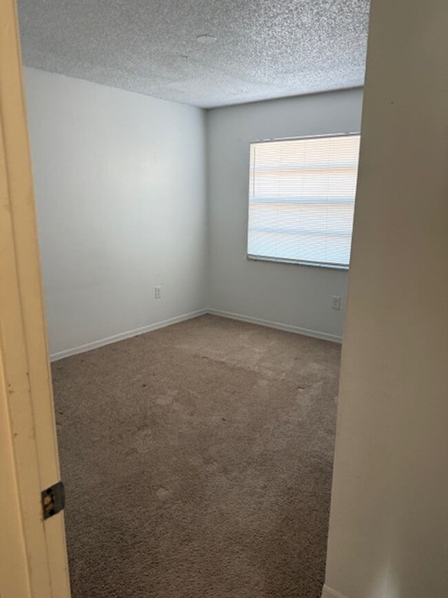 Building Photo - CORAL GARDENS 2-BEDROOM CONDO