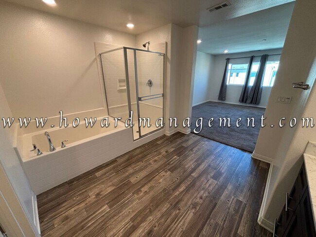 Building Photo - 3 Bed 3 Bath, Three Story Townhome with pr...