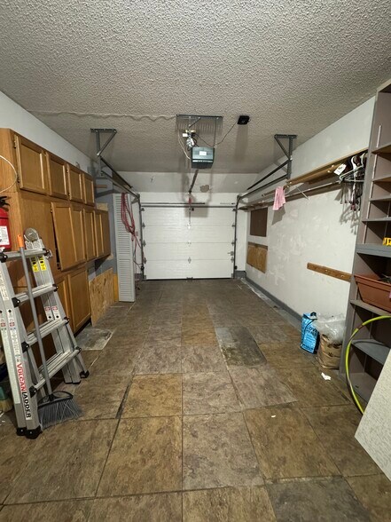 Attached garage with lots of storage - 705 Lake Ave