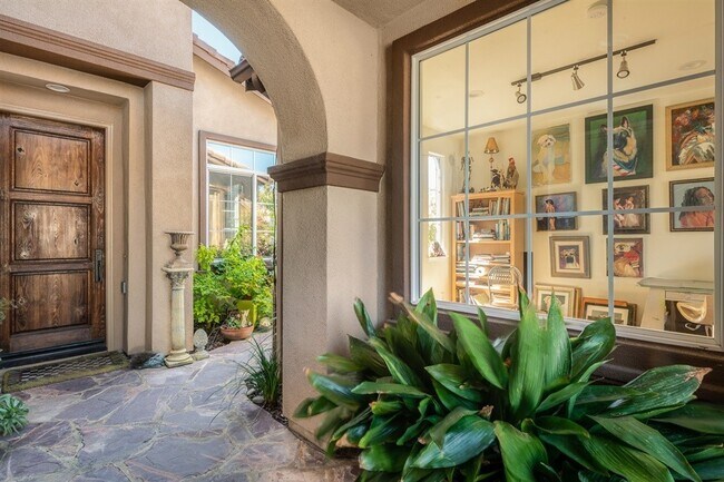 Building Photo - Gated corner lot home walking distance to the beach