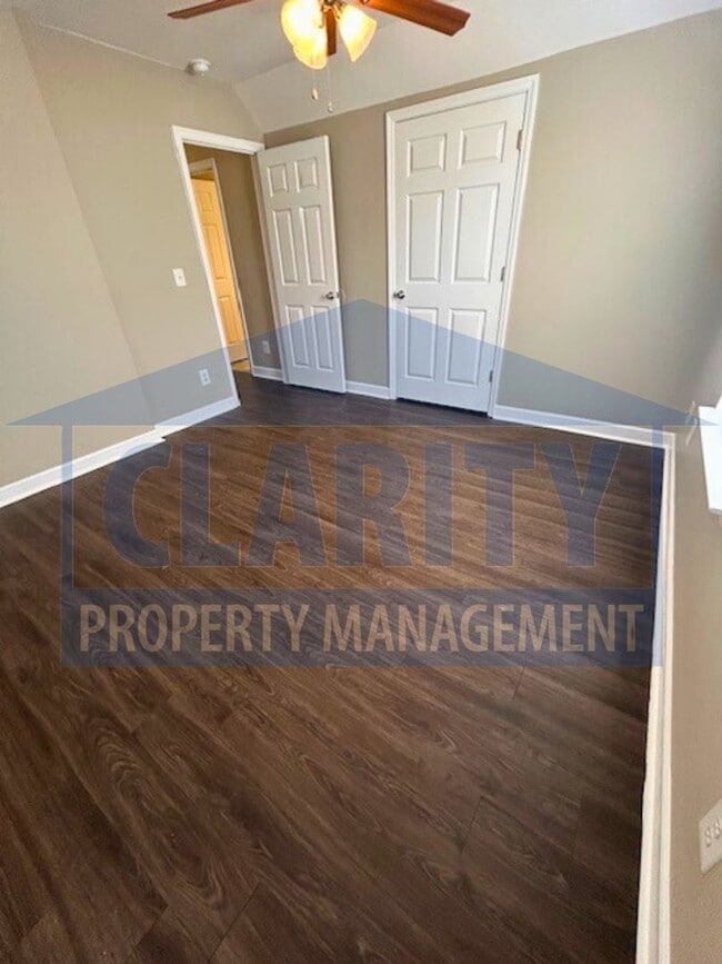 Building Photo - Charming three-bedroom home with carport!