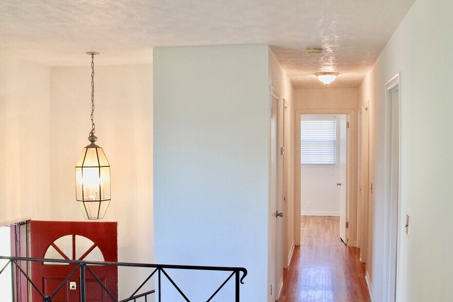 Fresh Paint throughout whole house. Hardwood floors on top level. - 4807 Jeffery Dr