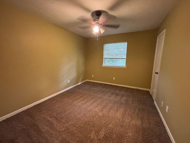 Building Photo - Corner lot in Southern Hills... Lawn included with rent.