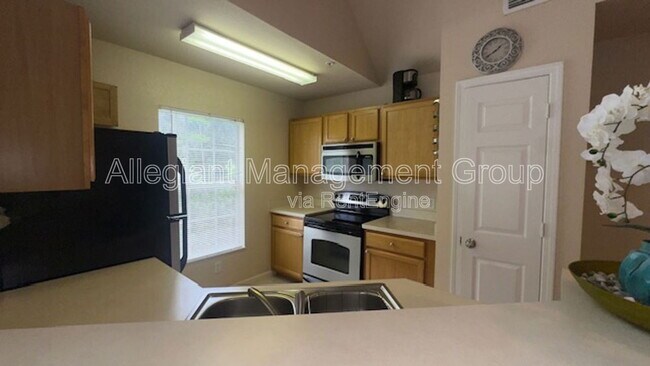 Building Photo - 9117 Lee Vista Blvd