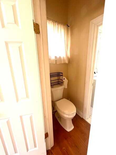 Half bath (pic is of downstairs unit but identical layout) - 2900 Palmer Ave