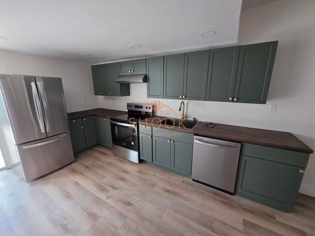 Building Photo - COMPLETELY RENOVATED 3 BR HOME
