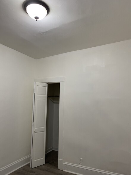 Bedroom 1 with deep closet - 282 Yates St
