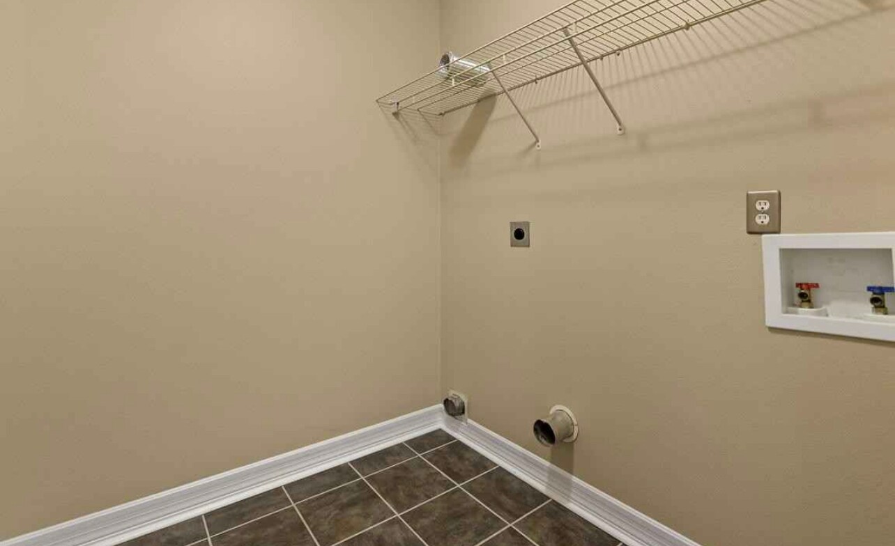 Laundry room Through garage but off to side - 14870 E Shadow Creek Dr
