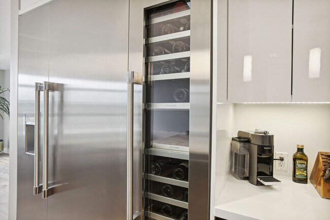 Building Photo - Elegant 2BR at The Adora | 1,500+ SF, Chef’s Kitchen & Garage Parking!