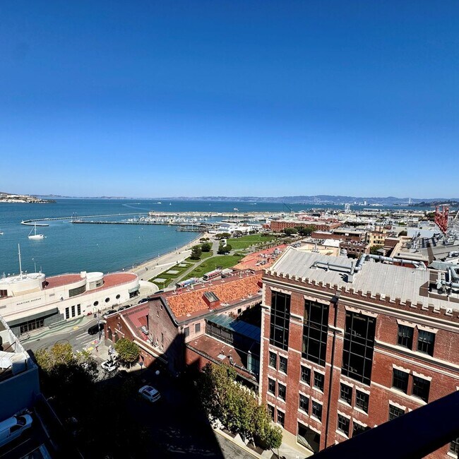 Building Photo - Just Unpack, Pour a Beverage, & Cue the Su...