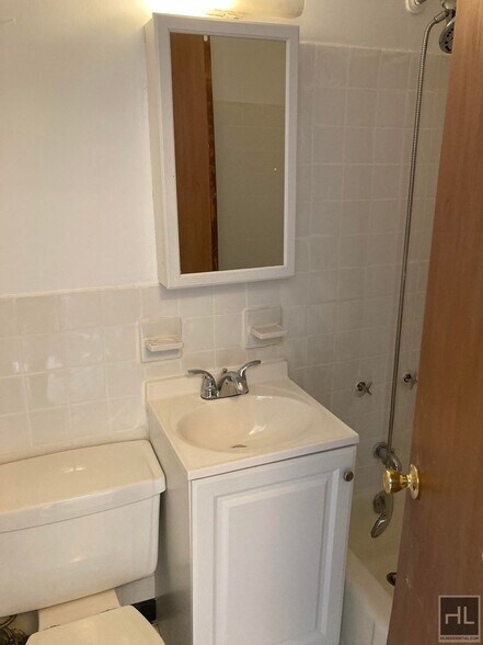 Building Photo - NO FEE Studio in Lenox Hill! Won't Stay on...