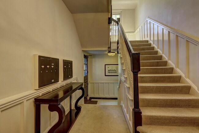 Foyer and staircase to Unit 19 - 1 S Prado NE
