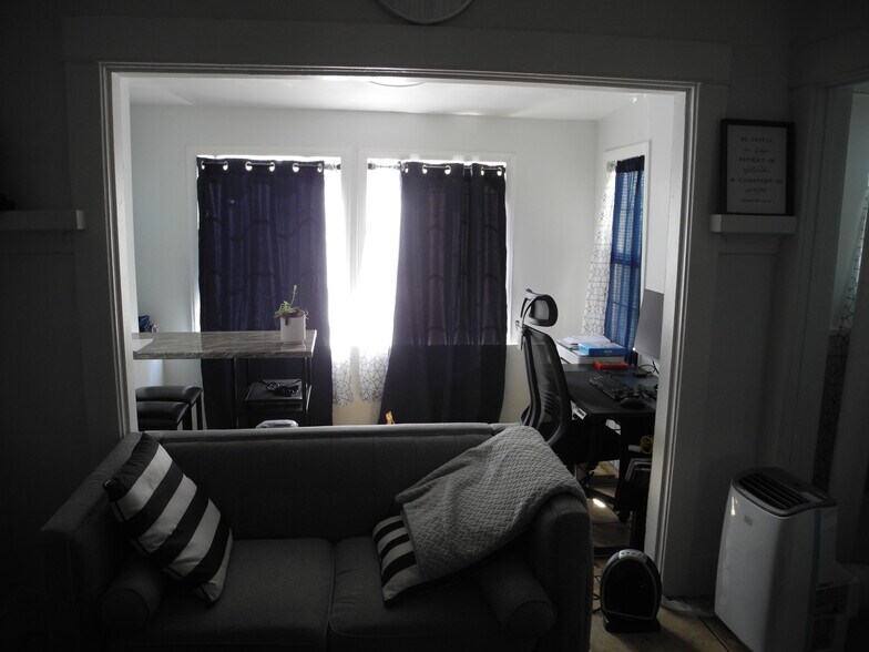Sunroom shining in on living room - 1934 Henderson Ave