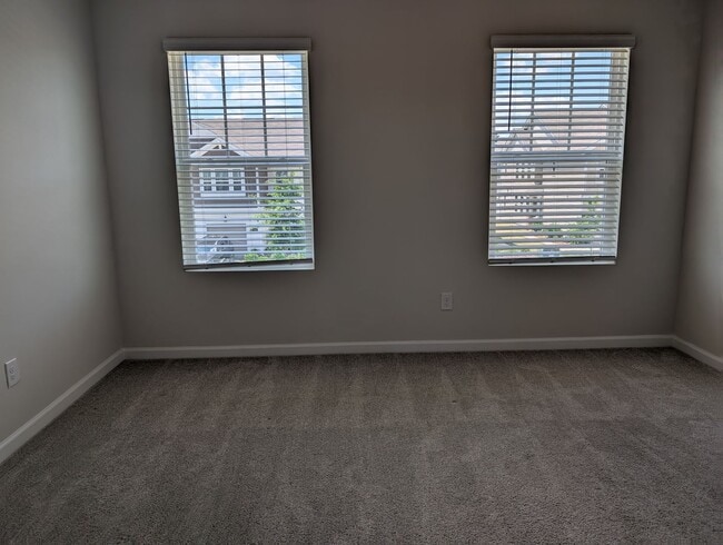 Building Photo - Elegant, Move In ready townhome located in...
