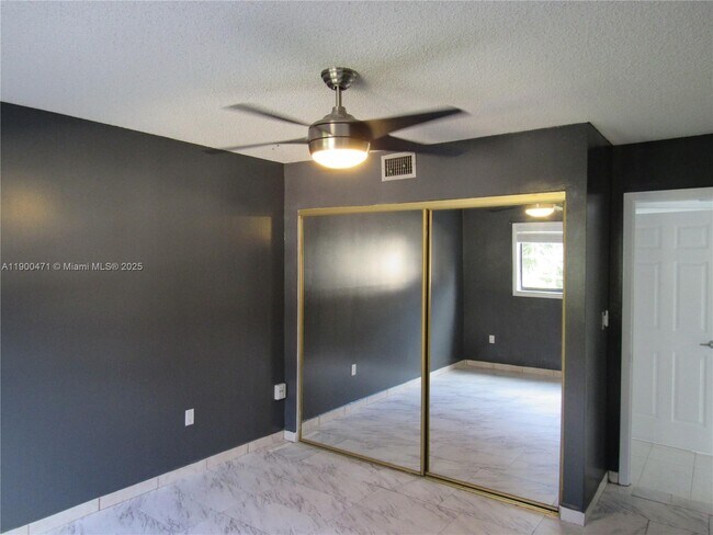 Building Photo - 5490 W 21st Ct
