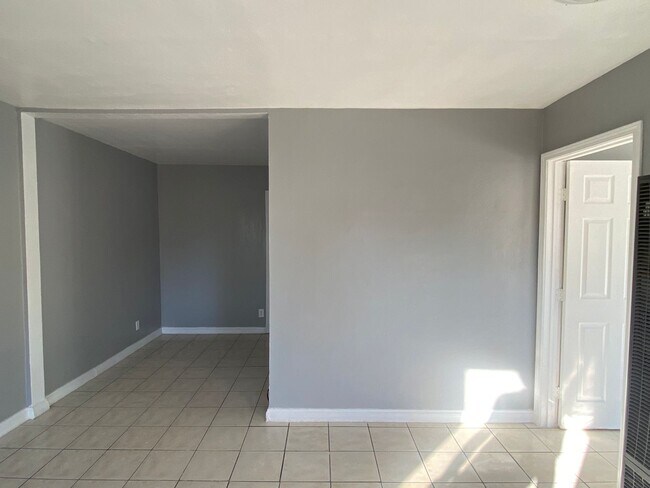 Building Photo - Hard to Find 1 BD 1 BA House with a 2 car garage and it's own yard.