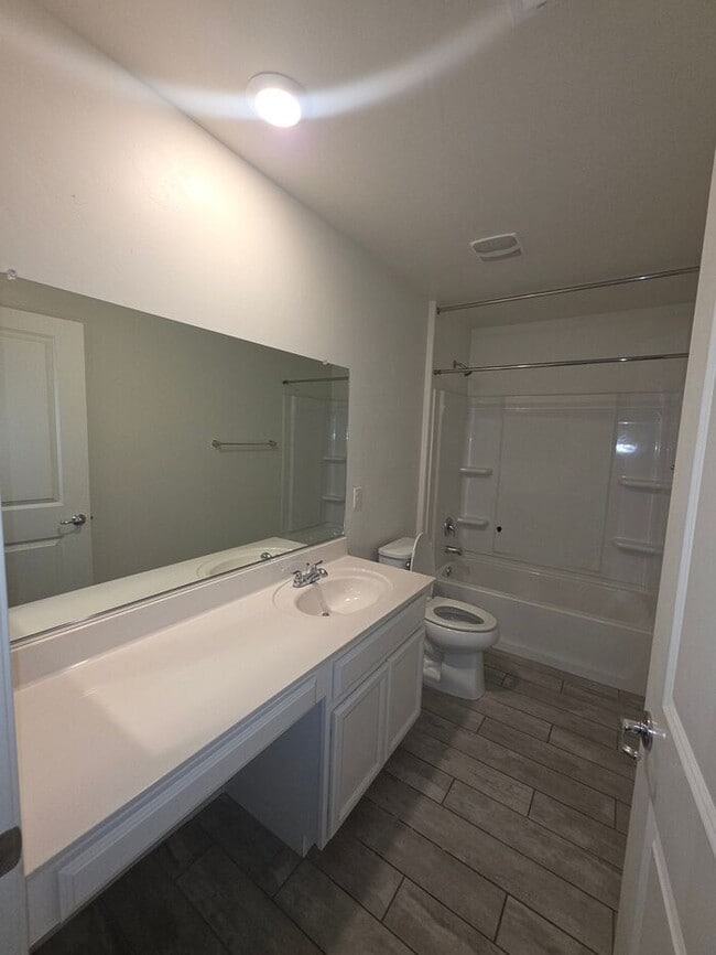 Building Photo - COMING SOON! New 3BR 2 BA Home w/ 2-Car Garage • Stainless Kitchen • Timer-Irrigated Yard in East...