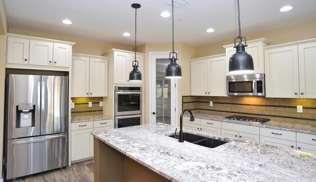 Building Photo - Oro Valley Executive home! Former model in...