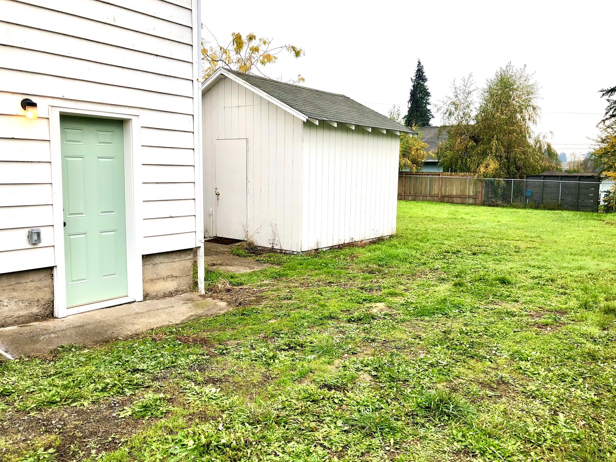 Back door and shed. - 105 W 2nd St Lower