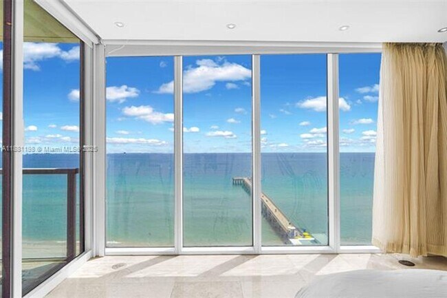 Building Photo - 16699 Collins Ave