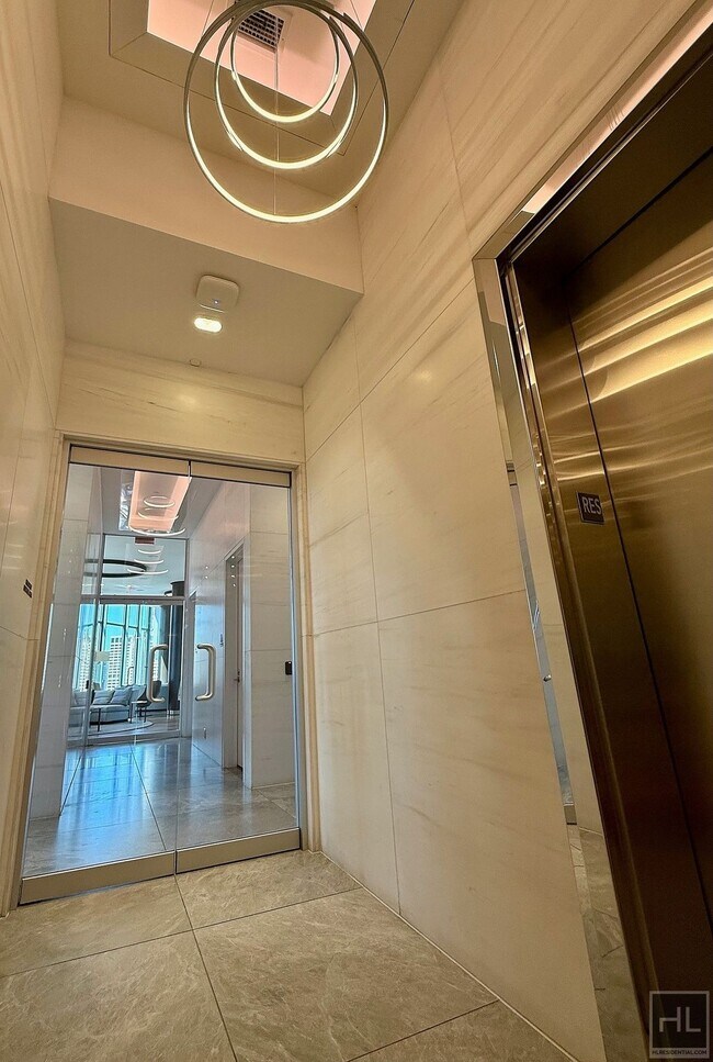 Building Photo - SUNNY NO FEE STUDIO IN THE LUXURY SUMMIT NYC