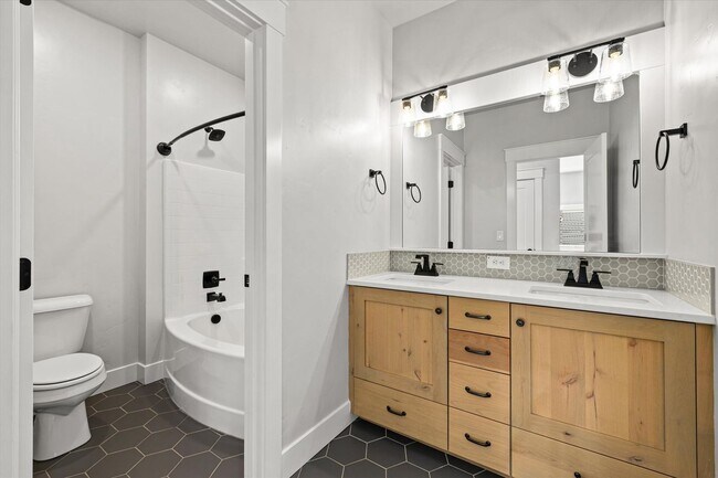 Building Photo - Luxury 4-Bedroom Home for Rent in Dry Cree...