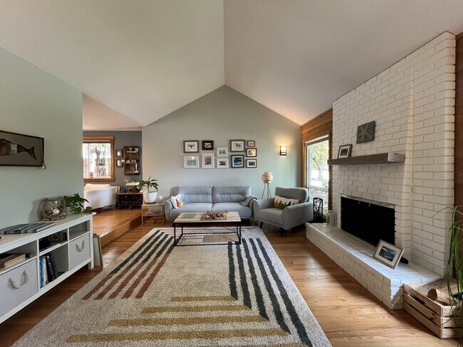 Building Photo - Bright and Open 4 Bedroom Cedar Mill Home with Vaulted Ceilings, Skylights & Multiple Living Areas