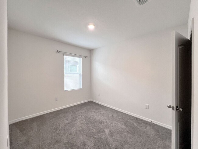 Building Photo - Four-Bedroom Home with Modern Finishes & Open Layout